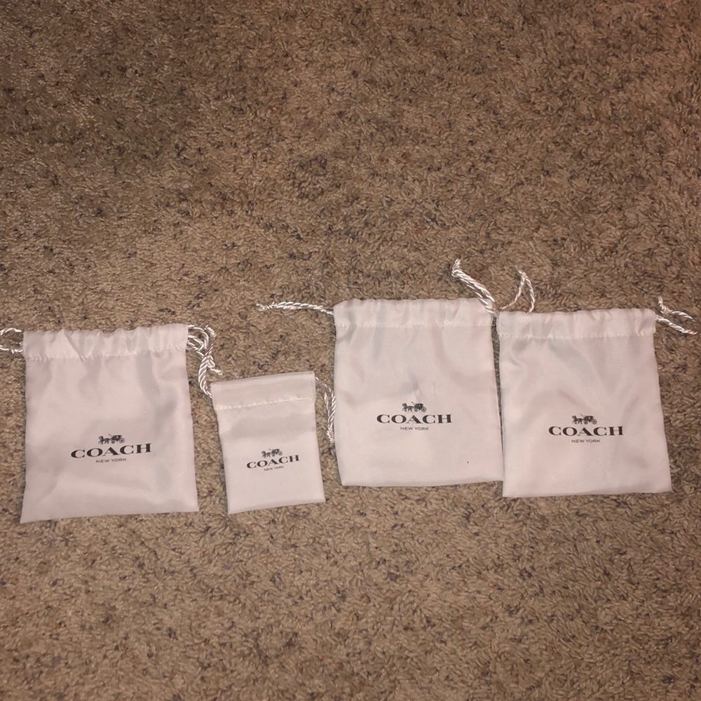 Brand new empty coach jewelry pouches BUNDLE
